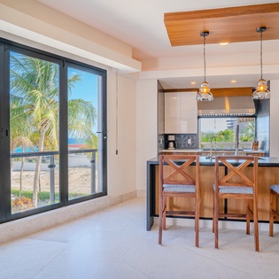 Kitchen area with bar seating