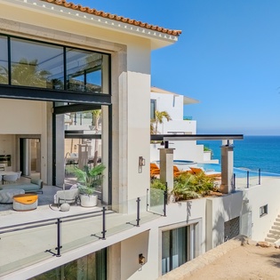 Modern beachfront villa with stunning ocean views and luxury design elements.