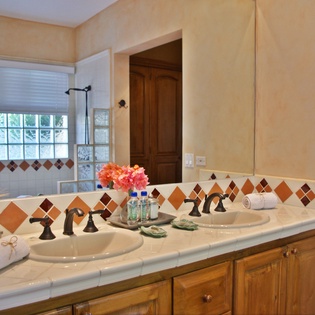 En suite bathroom with double sink