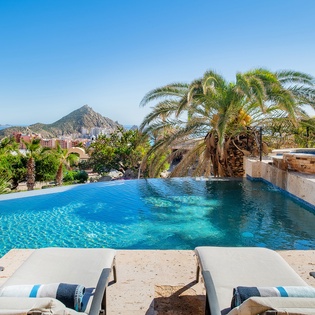 Lay poolside with incredible ocean views all around
