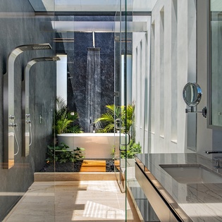 En suite bathroom with walk in shower