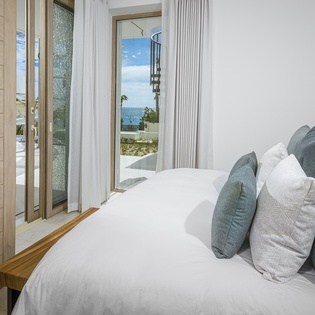 Bedroom suite with patio access