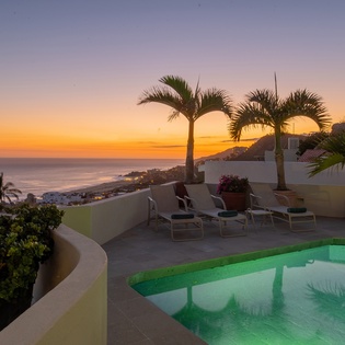 Poolside with incredible ocean view during sunset