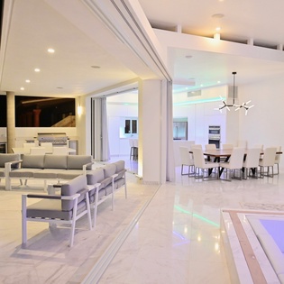 Open living area extends to the outdoor terrace