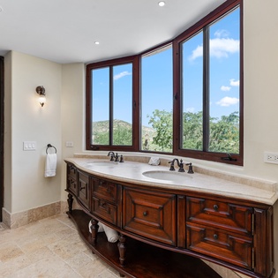 En suite bathroom with double sink