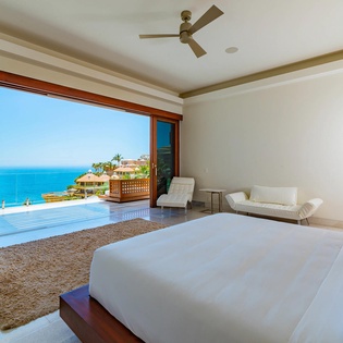 Bedroom suite with terrace access and view