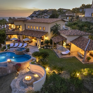 Bird's eye view of villa during sunset