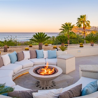 Firepit with outdoor seating and ocean views