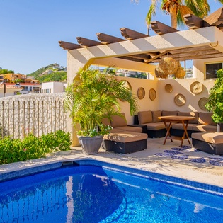 Poolside patio with outdoor seating
