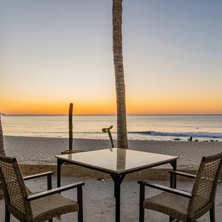 Outdoor seating with beachfront views