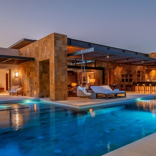 Exterior and pool at sunset