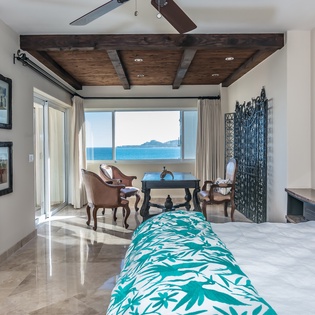 Bedroom suite with balcony and ocean views