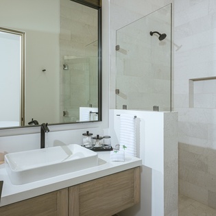 En suite bathroom with walk in shower