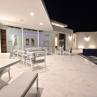 Open living area extends to the outdoor terrace