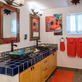 Shared bathroom with double sink