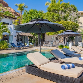Poolside patio with sunny lounge chairs
