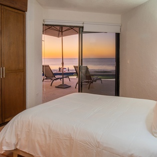 Bedroom suite with patio and beach access
