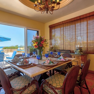 Dining area seating 8 with ocean views