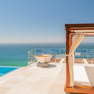 Patio with outdoor bed and ocean view -1