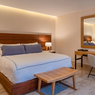 Bedroom suite with vanity area