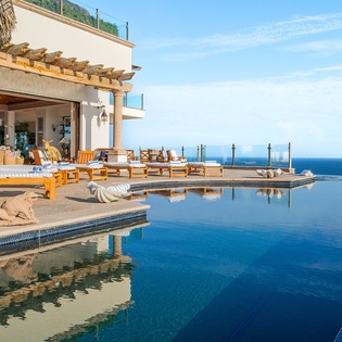 Poolside view of villa exterior