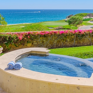 Poolside with incredible ocean and golf course views