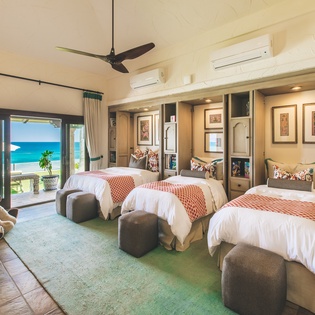 Triple bed suite with beach front views