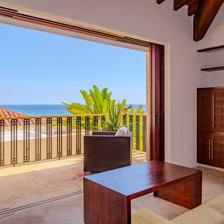 Bedroom suite with private terrace and ocean views