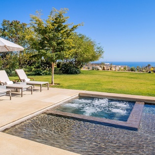 Poolside patio with ocean views