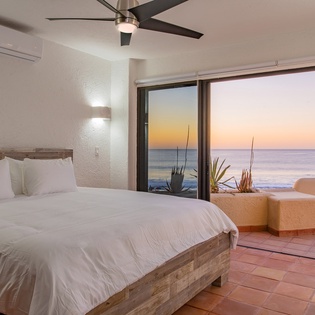 Bedroom suite with patio and beach access