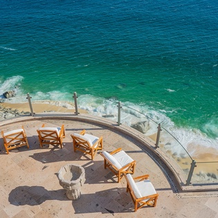 Outdoor seating with beachfront views
