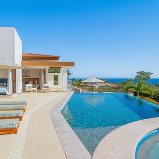 Gorgeous poolside patio with ocean view