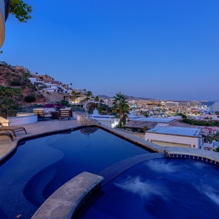 Pool and jacuzzi with ocean views