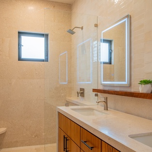 En suite bathroom with double sink