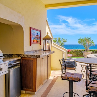 Patio with outdoor seating and BBQ