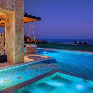Exterior and pool at sunset