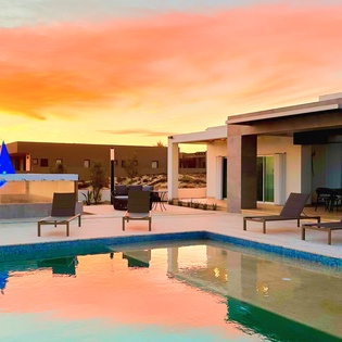 Poolside with beachfront views