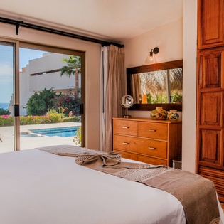 Bedroom suite with patio access