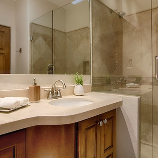 En suite bathroom with walk in shower
