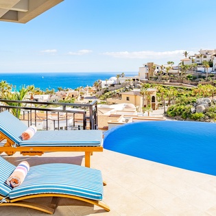 Lounge by the pool with an amazing ocean view