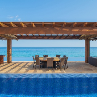 Poolside patio with ocean views