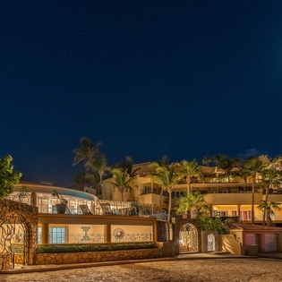 Villa exterior at night