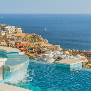 Sunny poolside with ocean views
