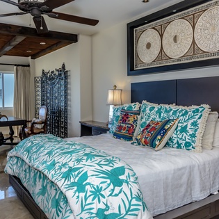 Bedroom suite with balcony and ocean views