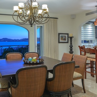 Dining and kitchen area with ocean views