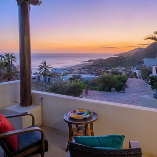Terrace with outdoor seating and ocean view
