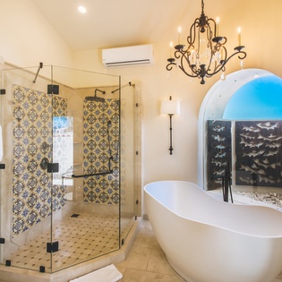 En suite bathroom with bath and walk in shower