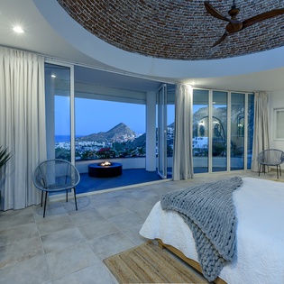 Bedroom suite with fire pit and views
