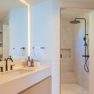 En suite bathroom with walk in shower