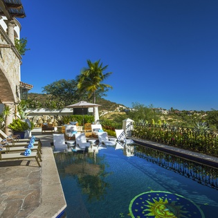 Your private infinity pool terrace offers stunning loungers and shade, perfect for soaking up the tropical paradise atmosphere.